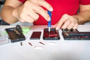 device repair with screwdriver on a table 2026 03 16 01 22 36 utc